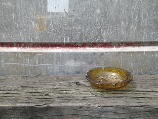 Image showing ashtray, brown, bench, wood, metal, object, break, seat, habit, bad, cancer, quit