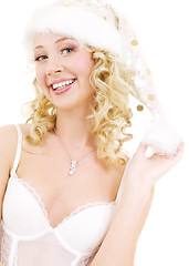 Image showing cheerful santa helper girl