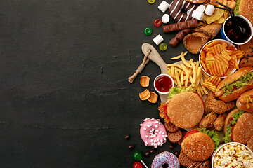 Image showing Fast food dish on black stone background