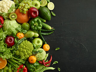 Image showing Healthy food dish on black stone background