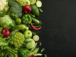 Image showing Healthy food dish on black stone background