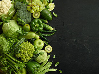 Image showing Healthy food dish on black stone background