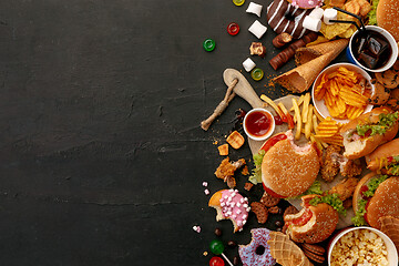 Image showing Fast food dish on black stone background