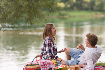 Image showing Couple in love enjoying picnic time