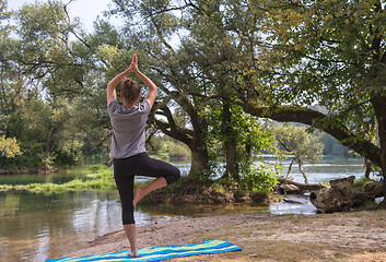 Image showing woman meditating and doing yoga exercise