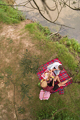 Image showing top view of couple enjoying picnic time