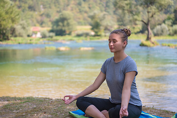 Image showing woman meditating and doing yoga exercise