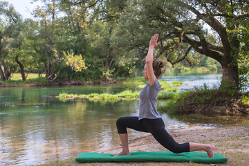 Image showing woman meditating and doing yoga exercise