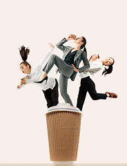 Image showing Office workers jumping isolated on studio background