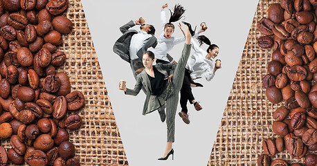 Image showing Office workers jumping isolated on studio background