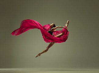 Image showing Young graceful female ballet dancer dancing in mixed light