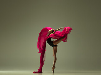 Image showing Young graceful female ballet dancer dancing in mixed light