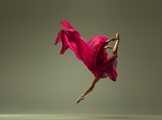 Image showing Young graceful female ballet dancer dancing in mixed light