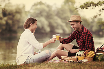 Image showing Couple in love enjoying picnic time