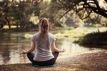 Image showing woman meditating and doing yoga exercise