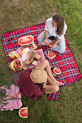 Image showing top view of couple enjoying picnic time