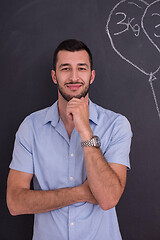 Image showing portrait of man in front of black chalkboard