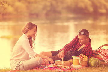 Image showing Couple in love enjoying picnic time