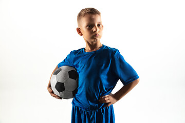 Image showing Young boy as a soccer or football player on white studio background