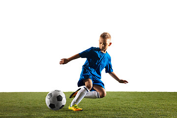 Image showing Young boy as a soccer or football player on white studio background