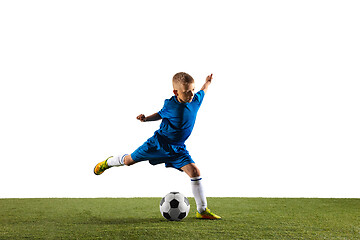 Image showing Young boy as a soccer or football player on white studio background