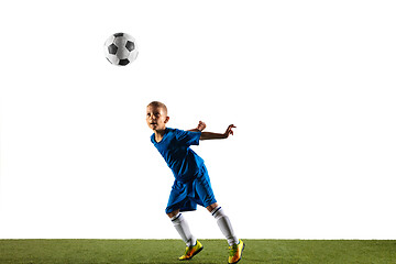 Image showing Young boy as a soccer or football player on white studio background