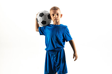 Image showing Young boy as a soccer or football player on white studio background