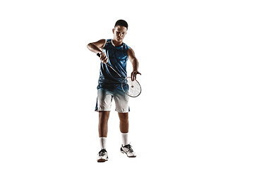 Image showing Little boy playing badminton isolated on white studio background