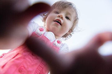 Image showing little girl spending time at backyard