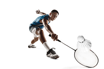 Image showing Little boy playing badminton isolated on white studio background