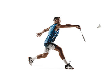 Image showing Little boy playing badminton isolated on white studio background