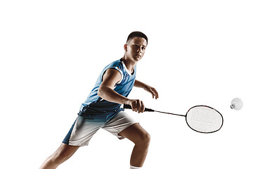 Image showing Little boy playing badminton isolated on white studio background