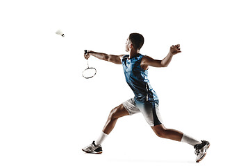 Image showing Little boy playing badminton isolated on white studio background