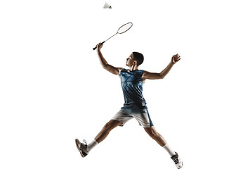 Image showing Little boy playing badminton isolated on white studio background