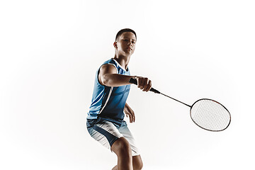 Image showing Little boy playing badminton isolated on white studio background