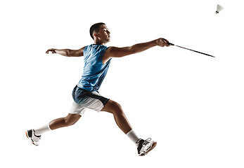 Image showing Little boy playing badminton isolated on white studio background