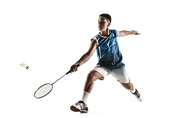 Image showing Little boy playing badminton isolated on white studio background