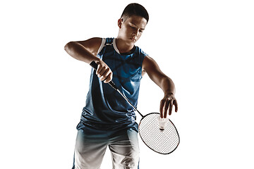 Image showing Little boy playing badminton isolated on white studio background