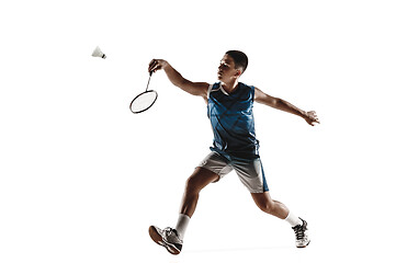 Image showing Little boy playing badminton isolated on white studio background