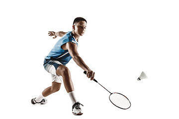 Image showing Little boy playing badminton isolated on white studio background