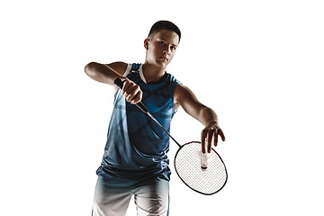 Image showing Little boy playing badminton isolated on white studio background