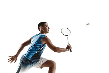 Image showing Little boy playing badminton isolated on white studio background