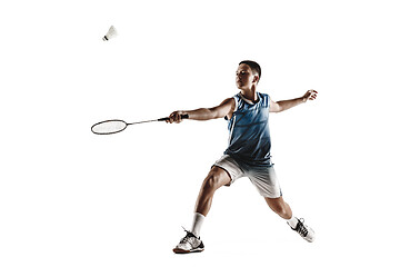 Image showing Little boy playing badminton isolated on white studio background