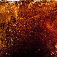 Image showing Close up view of the ice cubes in dark cola background