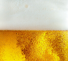 Image showing Close up view of floating bubbles in light beer texture