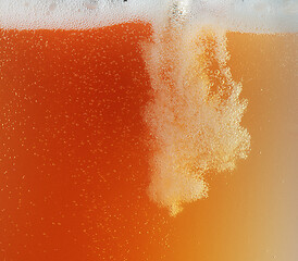 Image showing Close up view of floating bubbles in unfiltered beer texture