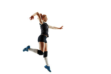 Image showing Young female volleyball player isolated on white studio background