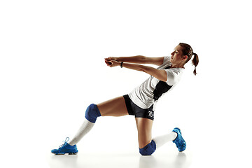 Image showing Young female volleyball player isolated on white studio background