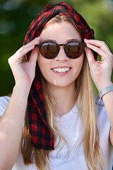 Image showing portrait of beautiful, emotional, young woman in sunglasses.