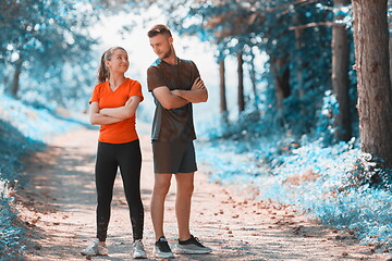 Image showing young couple preparing for a morning run